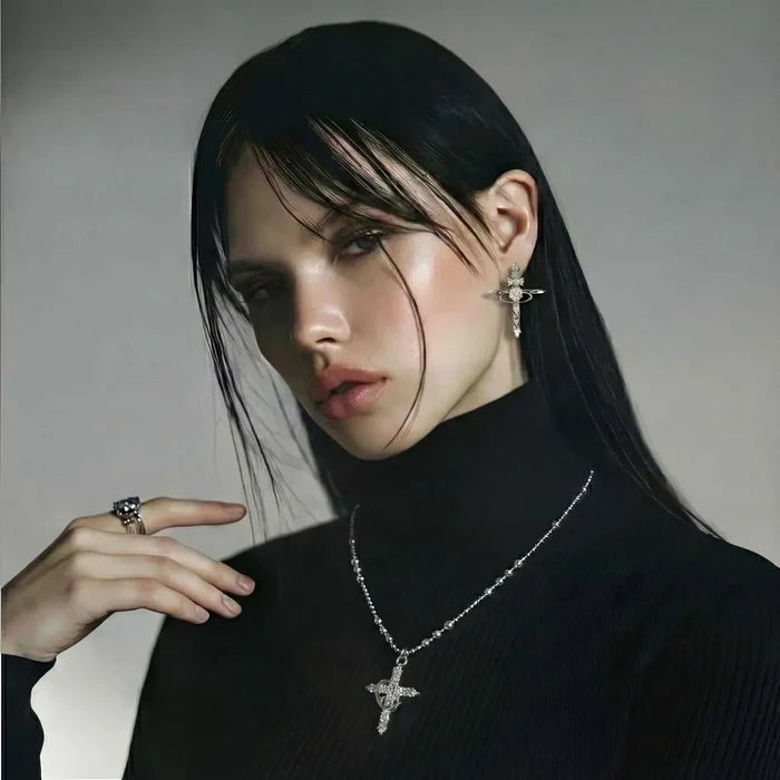 Divine Grace Zirconia Cross Necklace with a silver-tone cross pendant, sparkling stones, crown detail and faceted bead chain