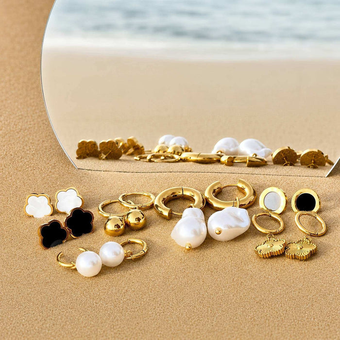 Flower Stud Earrings Style 1, gold-tone flower-shaped studs with white and black enamel petals and textured edges