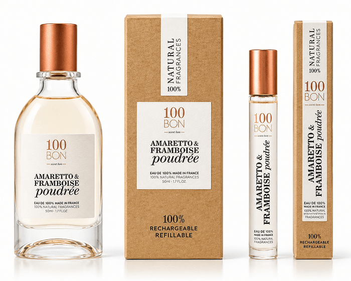 100 Bon Amaretto & Framboise gift set with clear glass perfume bottles, copper caps, and tan cartons