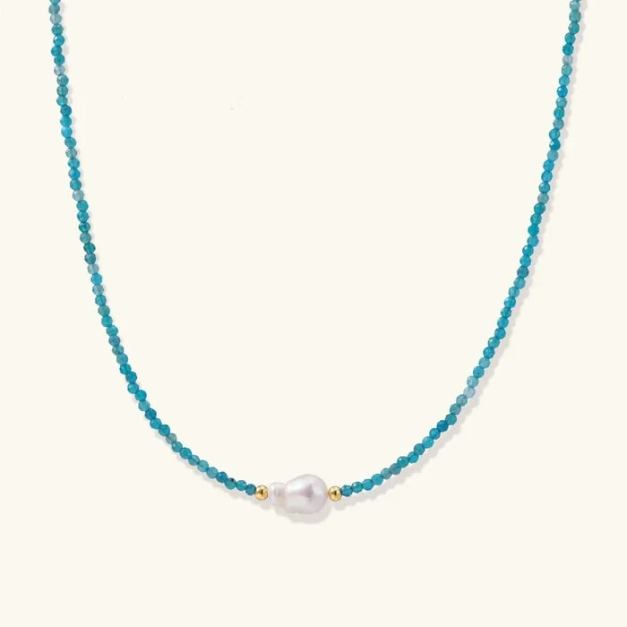 Apatite Pearl Strand Necklace with tiny faceted teal-blue beads, a luminous white pearl centerpiece and gold-tone accents