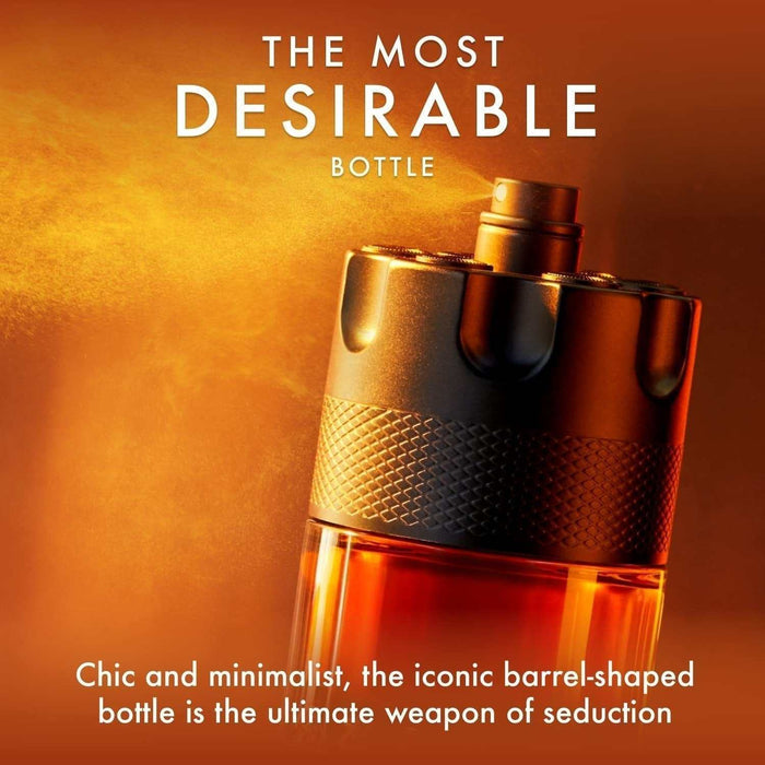 Azzaro The Most Wanted Parfum bottle in amber glass with a black textured barrel-shaped cap and gold accents