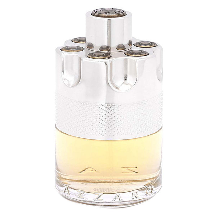 Azzaro Wanted Eau de Toilette in a clear glass bottle with pale amber fragrance, textured white band, and silver barrel-style cap.