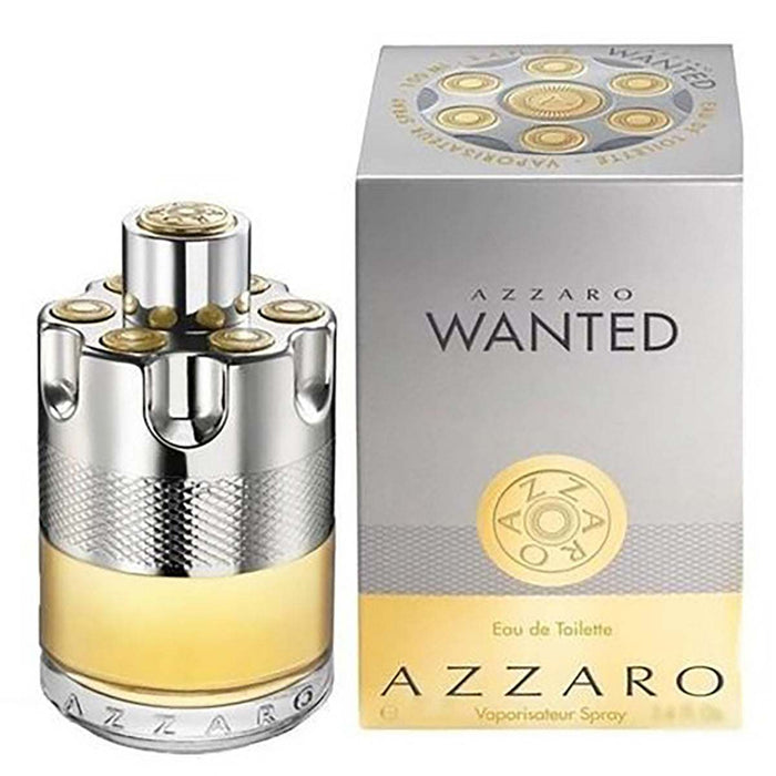 Azzaro Wanted Eau de Toilette in a silver and gold cylindrical bottle with textured metal detailing and matching box