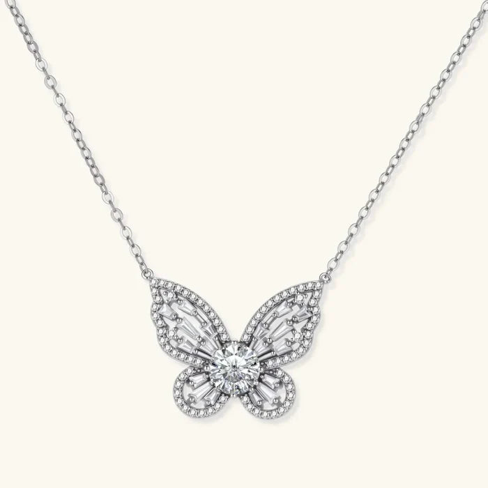 Butterfly Moissanite Necklace in silver-tone metal with a sparkling butterfly pendant, central round stone and pavé wing details