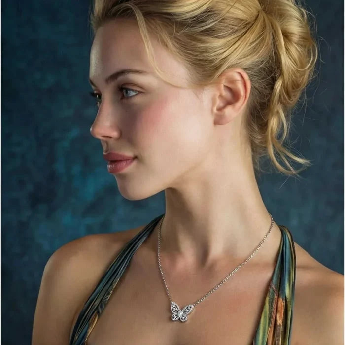 Butterfly Moissanite Necklace in silver-tone metal with a delicate chain and small sparkling butterfly pendant