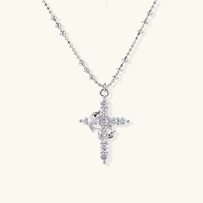 Divine Grace Zirconia Cross Necklace in silver-tone plating, featuring a sparkling stone-set cross, crown motif and beaded chain