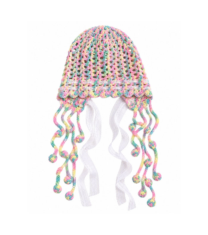 Multicolor crochet cap with lace edge and dangling tassels, pink accents