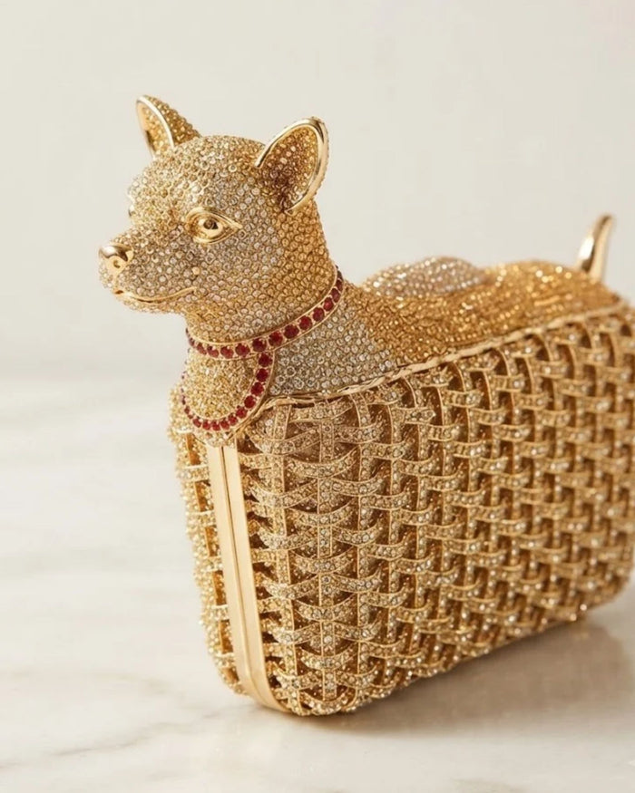 Gold dog-shaped crystal clutch with red gem collar, rhinestone lattice