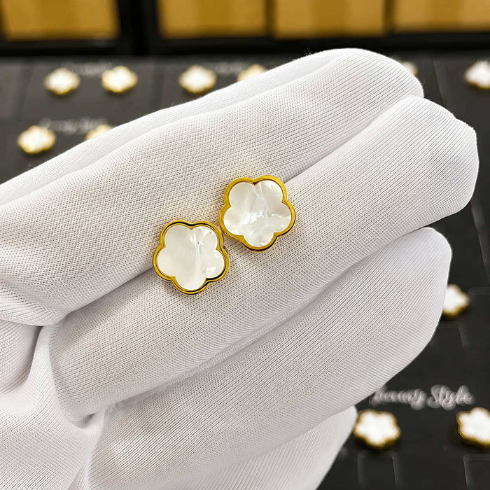 Flower Stud Earrings Style 2 in gold-tone metal with white flower-shaped inlays and softly scalloped edges