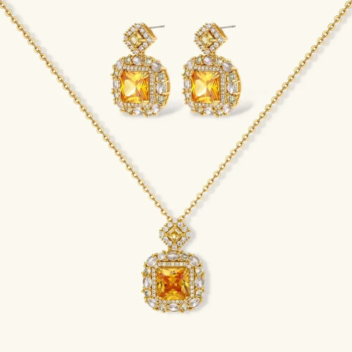 Golden Square Zirconia Necklace and matching earrings in gold tone, with amber square stones framed by clear and pale yellow gems