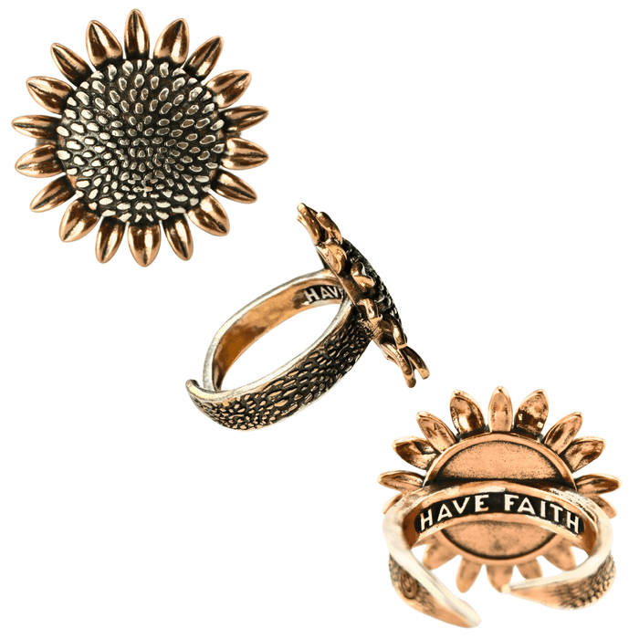 A boho-style adjustable ring with a large sunflower design in vintage gold and silver colors.