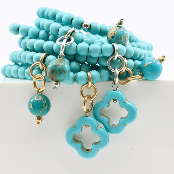 multiple colorful beaded boho wrap bracelets in 4 bright colors made with howlite beads. this image shows the turquoise blue one in both finish options