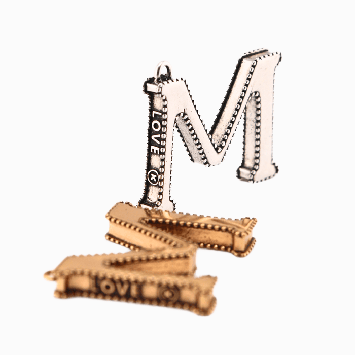 M / Antique Gold