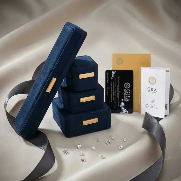LOVE Moissanite Necklace is not visible; the image shows loose clear stones, navy velvet jewelry boxes and certificates.