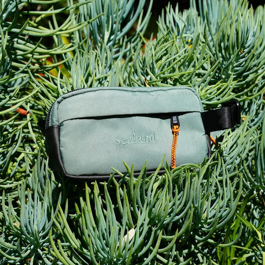 MajiTex Mini Crossbody Bag - Green pouch with 'sealand' branding