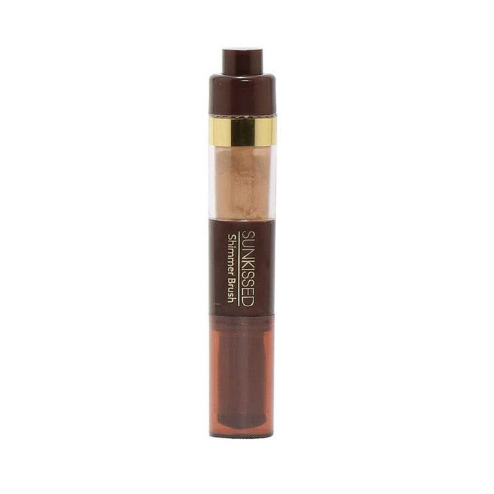 Women Sunkissed Dusting Makeup Brush in a brown cylindrical tube with a gold band and visible shimmer powder